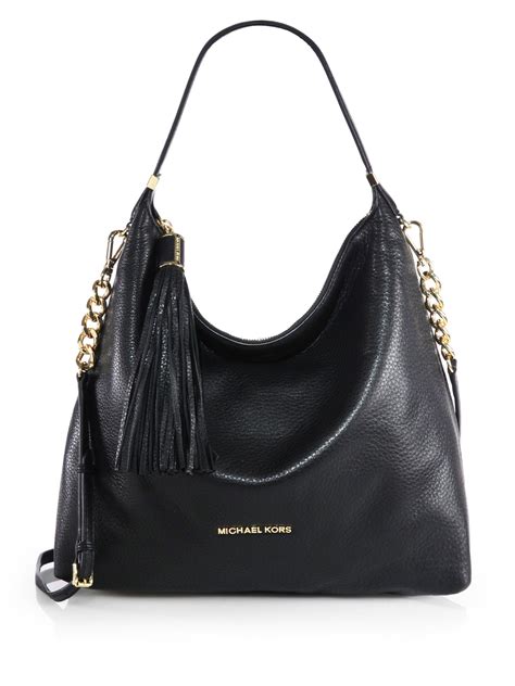 michael kors bags at selfridges|Michael Kors black handbags.